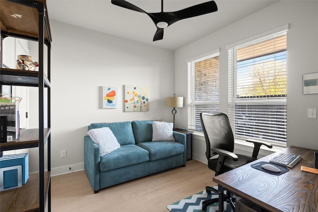 200 W 56th St Unit 4102, Austin, TX 78751 - home office featuring a ceiling fan and wood finished floors