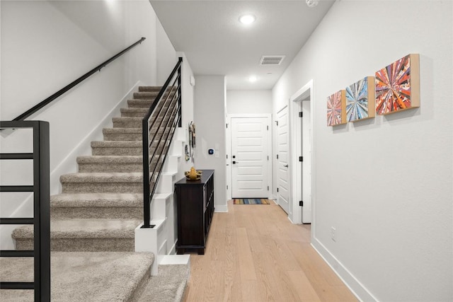 200 W 56th St Unit 4102, Austin, TX 78751 - stairs featuring wood finished floors and recessed lighting