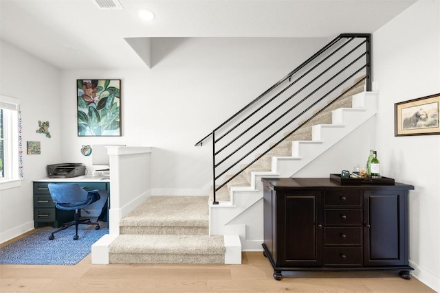 200 W 56th St Unit 4102, Austin, TX 78751 - staircase with baseboards and wood finished floors