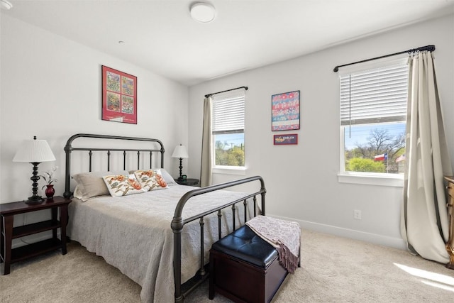 200 W 56th St Unit 4102, Austin, TX 78751 - bedroom with multiple windows and light colored carpet