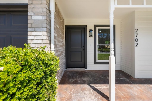 2702 Irish Bend Dr, Austin, TX 78745 - view of exterior entry featuring covered porch