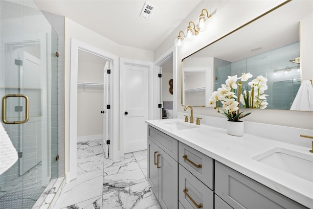 2702 Irish Bend Dr, Austin, TX 78745 - bathroom with visible vents, marble finish floor, a sink, and a stall shower