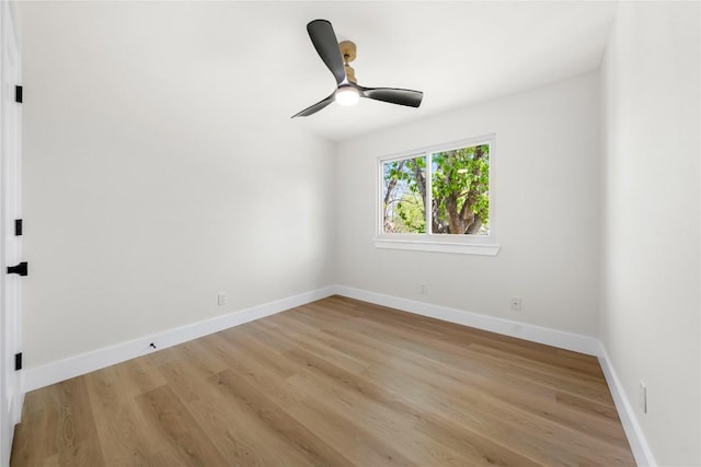 2702 Irish Bend Dr, Austin, TX 78745 - empty room featuring baseboards, light wood finished floors, and ceiling fan