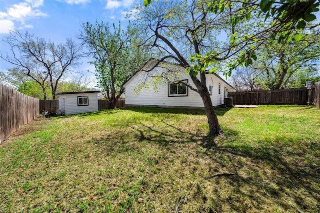 2702 Irish Bend Dr, Austin, TX 78745 - view of yard with an outbuilding and a fenced backyard