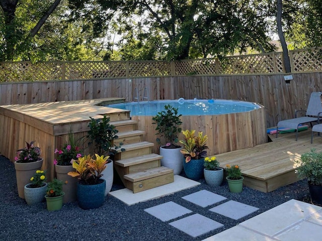6107 Amber Pass, Austin, TX 78745 - view of pool with a wooden deck