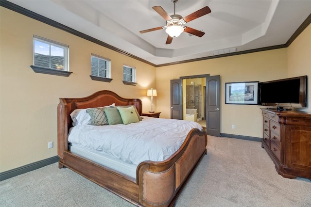 5612 Cherokee Draw Rd, Austin, TX 78738 - carpeted bedroom featuring a raised ceiling, connected bathroom, crown molding, and a ceiling fan