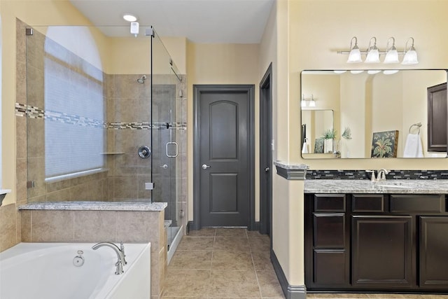 5612 Cherokee Draw Rd, Austin, TX 78738 - full bath featuring a bath, a shower stall, vanity, and tile patterned floors