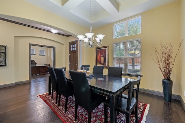 5612 Cherokee Draw Rd, Austin, TX 78738 - dining room with coffered ceiling, a chandelier, arched walkways, dark wood-style floors, and beamed ceiling