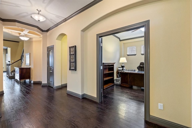 5612 Cherokee Draw Rd, Austin, TX 78738 - hallway with ornamental molding, arched walkways, dark wood-style flooring, a desk, and stairs