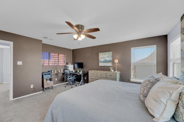 5812 Pescia St, Round Rock, TX 78665 - carpeted bedroom featuring baseboards, a desk, and a ceiling fan