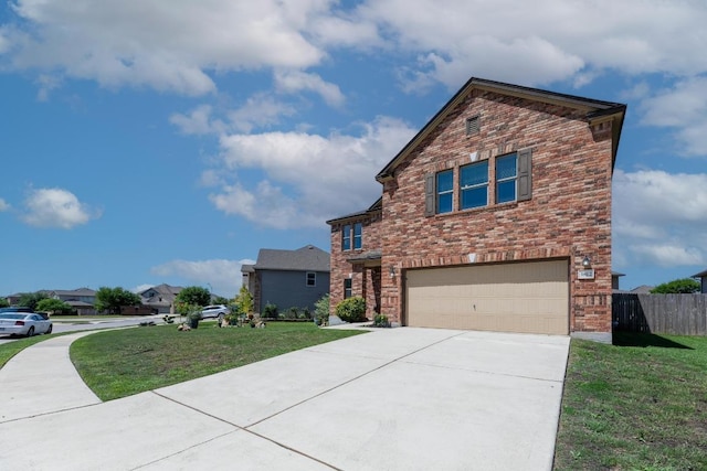 5812 Pescia St, Round Rock, TX 78665 - view of front facade with a garage, driveway, and brick siding