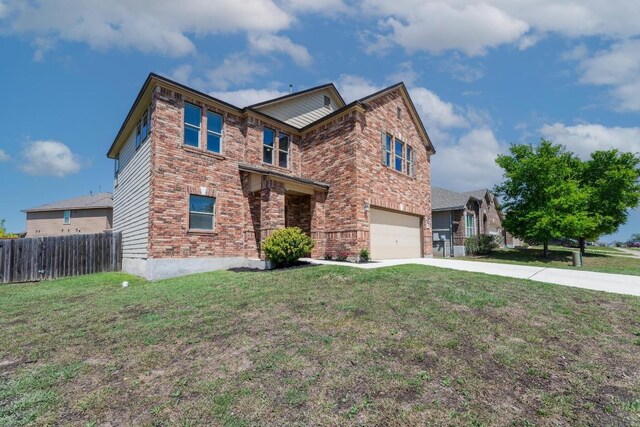5812 Pescia St, Round Rock, TX 78665 - traditional-style house with driveway, brick siding, and an attached garage