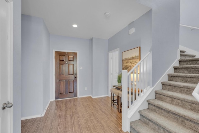 5812 Pescia St, Round Rock, TX 78665 - entryway featuring stairway, baseboards, light wood-type flooring, and recessed lighting