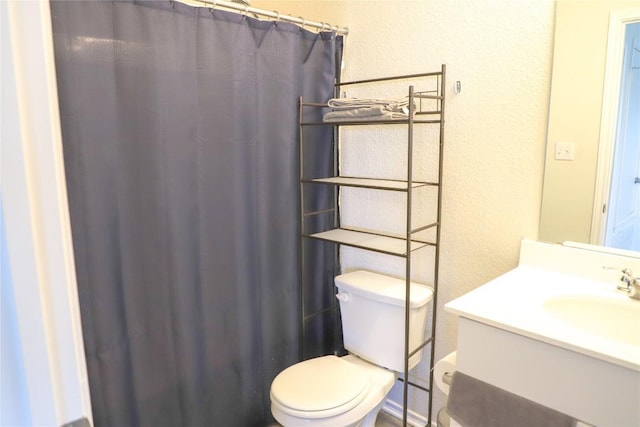 70 Snowy Plover Ln, Leander, TX 78641 - full bathroom with toilet, a textured wall, vanity, and curtained shower