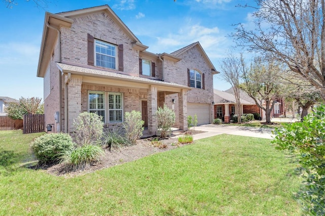 traditional-style home with a garage, a front lawn, fence, brick siding, and concrete driveway