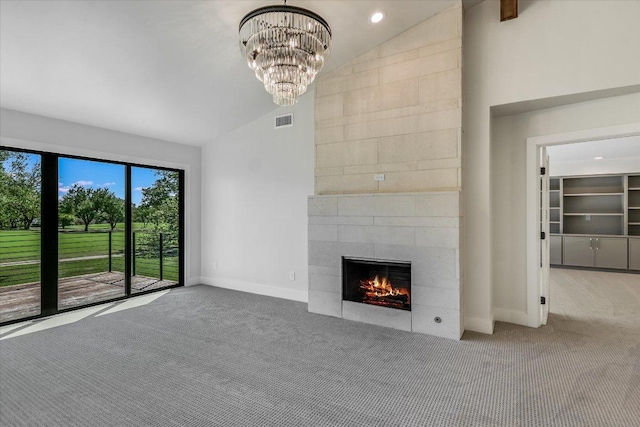 6304 Lost Horizon Dr, Austin, TX 78759 - unfurnished living room featuring vaulted ceiling, carpet, a tile fireplace, baseboards, and a chandelier
