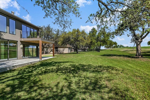 6304 Lost Horizon Dr, Austin, TX 78759 - view of grassy yard featuring a patio area and a balcony