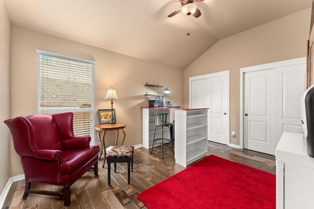 215 Choke Canyon Ln, Georgetown, TX 78628 - sitting room featuring dark wood-style flooring, ceiling fan, and vaulted ceiling