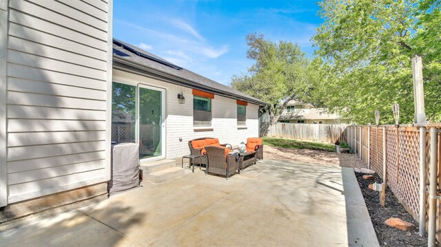 812 Saunders Dr, Round Rock, TX 78664 - fenced backyard featuring outdoor lounge area, a patio area, and entry steps