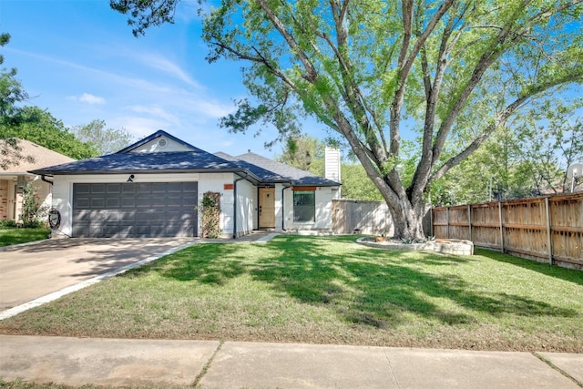 812 Saunders Dr, Round Rock, TX 78664 - ranch-style house with a chimney, an attached garage, and concrete driveway