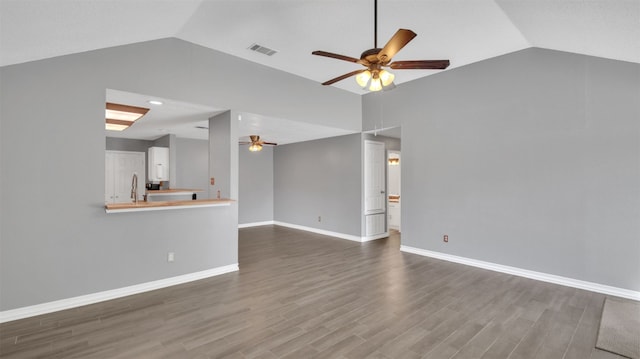 812 Saunders Dr, Round Rock, TX 78664 - unfurnished living room featuring lofted ceiling, ceiling fan, and wood finished floors