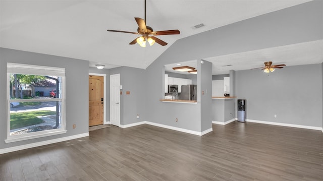 812 Saunders Dr, Round Rock, TX 78664 - unfurnished living room featuring ceiling fan, lofted ceiling, and dark wood-style floors