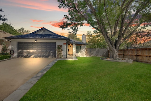 812 Saunders Dr, Round Rock, TX 78664 - ranch-style house featuring a chimney, driveway, and an attached garage