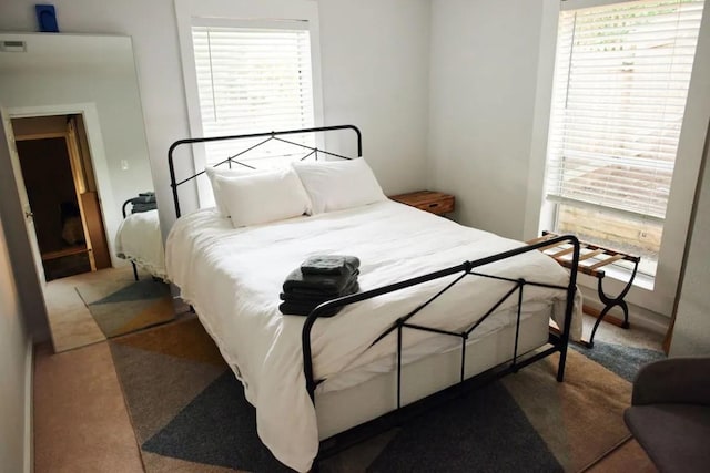 bedroom featuring carpet