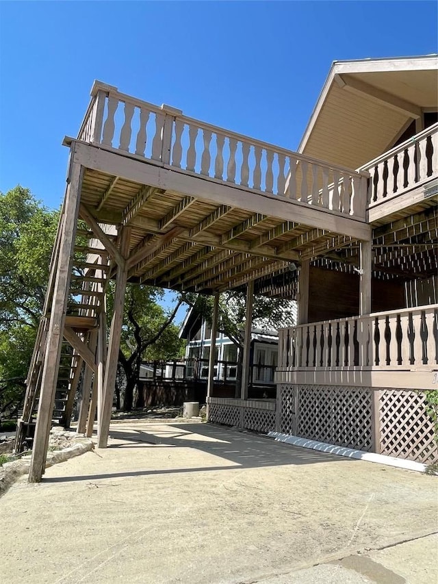 1530 Trailridge Dr, Canyon Lake, TX 78133 - surrounding community with stairway and a carport