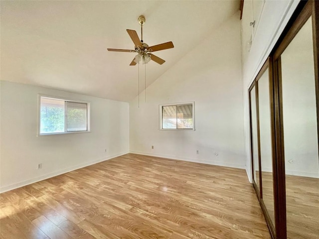 1530 Trailridge Dr, Canyon Lake, TX 78133 - unfurnished bedroom featuring light wood-type flooring, high vaulted ceiling, ceiling fan, and a closet