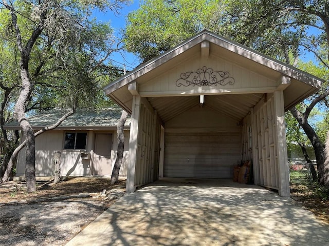 1530 Trailridge Dr, Canyon Lake, TX 78133 - garage with driveway and a detached carport