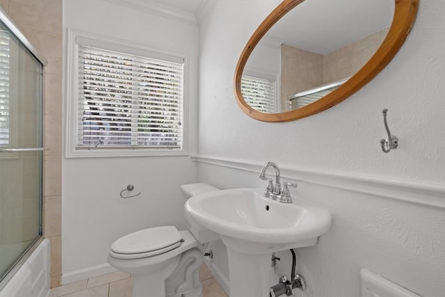 1905 Robinhood Trl, Austin, TX 78703 - full bath featuring tile patterned flooring, bath / shower combo with glass door, and ornamental molding