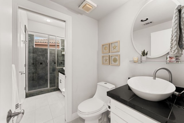 full bath with visible vents, vanity, toilet, tile patterned floors, and a shower stall