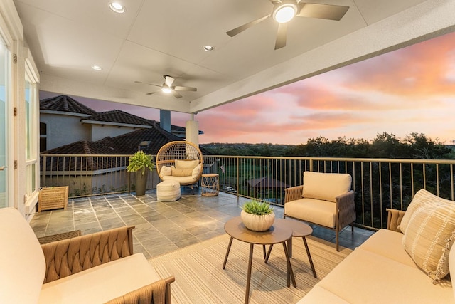 view of patio / terrace featuring a ceiling fan, outdoor lounge area, and a balcony
