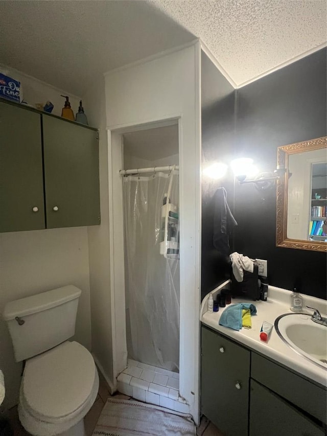 5202 Beechmoor Dr, Austin, TX 78723 - full bathroom with vanity, a textured ceiling, a stall shower, and toilet