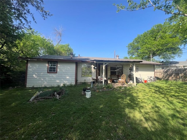 5202 Beechmoor Dr, Austin, TX 78723 - back of house featuring a yard and fence