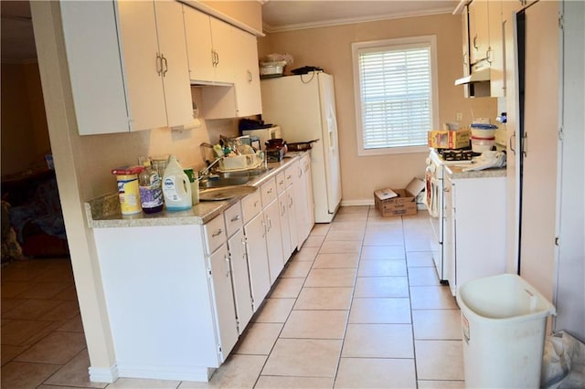 5202 Beechmoor Dr, Austin, TX 78723 - kitchen with white gas range oven, light countertops, ornamental molding, and a sink