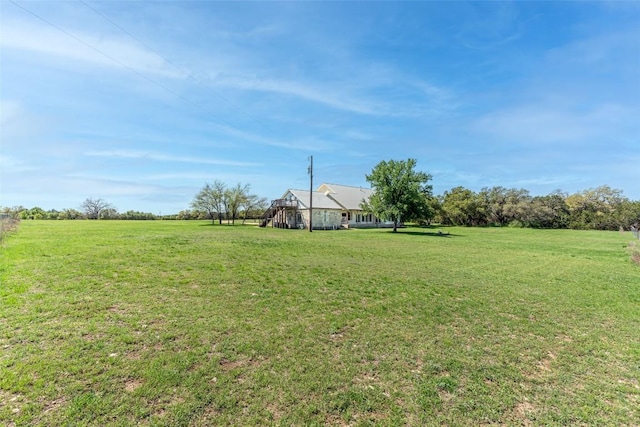 290 County Road 207, Liberty Hill, TX 78642 - view of green lawn featuring a view of rural / pastoral area