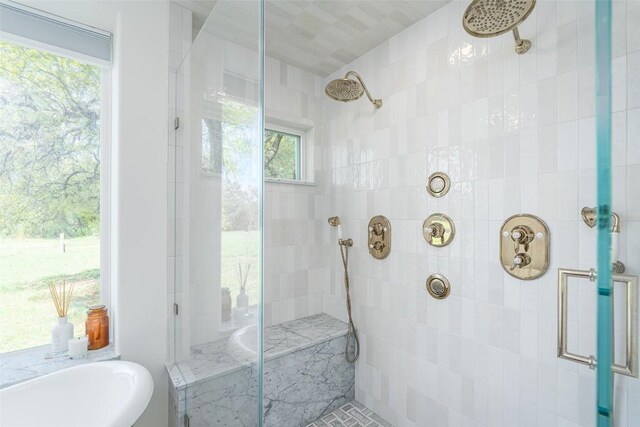 290 County Road 207, Liberty Hill, TX 78642 - bathroom featuring a shower stall and a soaking tub