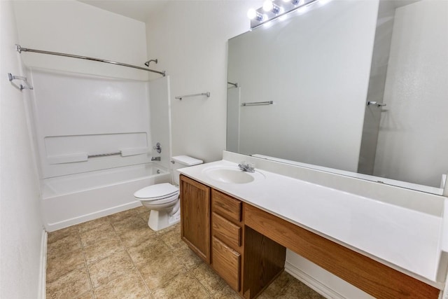 bathroom featuring toilet, vanity, and  shower combination