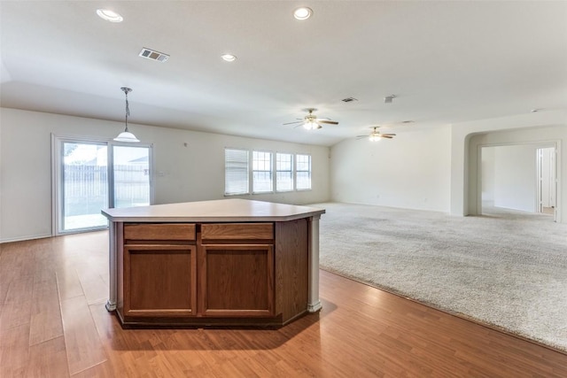 kitchen with light wood-style floors, a ceiling fan, visible vents, and recessed lighting