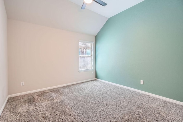2013 Garretts Way, Manchaca, TX 78652 - empty room featuring ceiling fan, carpet flooring, vaulted ceiling, and baseboards