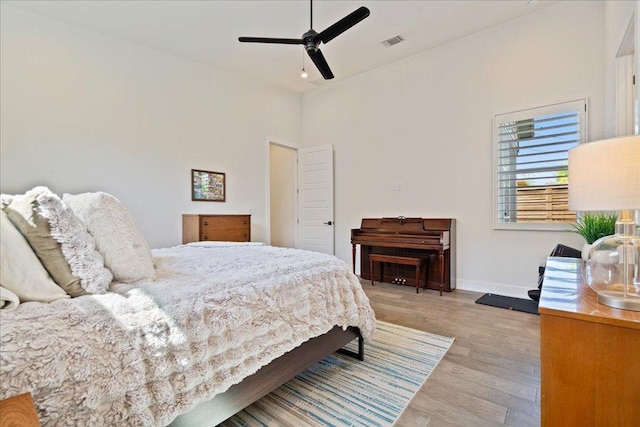 7009 Zachary Dr, Austin, TX 78724 - bedroom featuring light wood-type flooring, baseboards, and ceiling fan