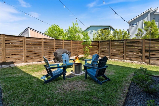 7009 Zachary Dr, Austin, TX 78724 - view of yard featuring a fire pit