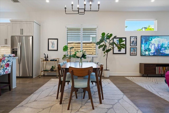 7009 Zachary Dr, Austin, TX 78724 - dining space featuring dark wood-style floors, recessed lighting, and a chandelier