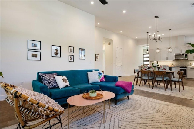 7009 Zachary Dr, Austin, TX 78724 - living area with recessed lighting, a chandelier, and light wood finished floors