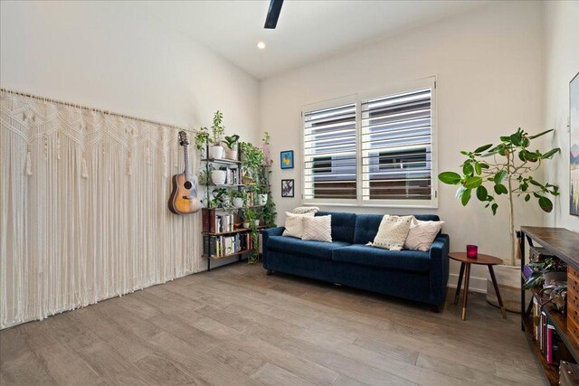 7009 Zachary Dr, Austin, TX 78724 - sitting room with wood finished floors and recessed lighting