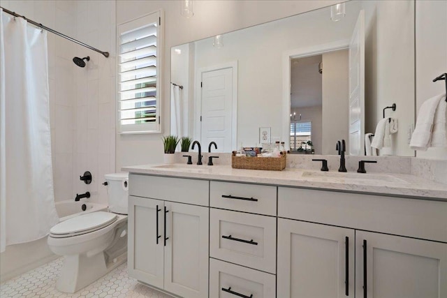 7009 Zachary Dr, Austin, TX 78724 - bathroom with double vanity, plenty of natural light, and shower / bath combo with shower curtain
