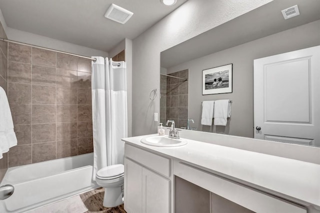 100 Vickers St, Georgetown, TX 78628 - bathroom with shower / tub combo, vanity, toilet, and visible vents