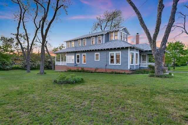 508 S Walnut St, Georgetown, TX 78626 - view of front facade featuring a yard and a chimney